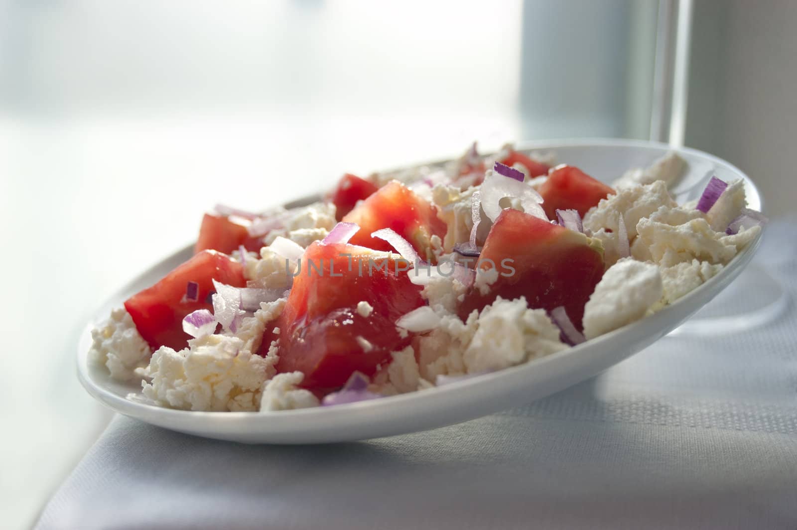 Cottage cheese and fresh tomatoes.