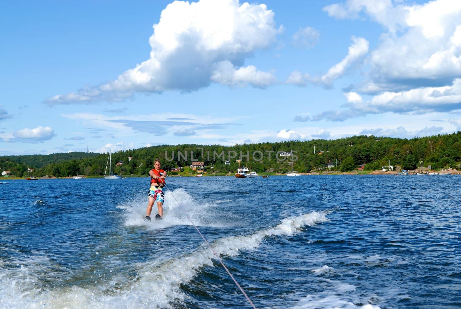 a man surfing. Please note: No negative use allowed.