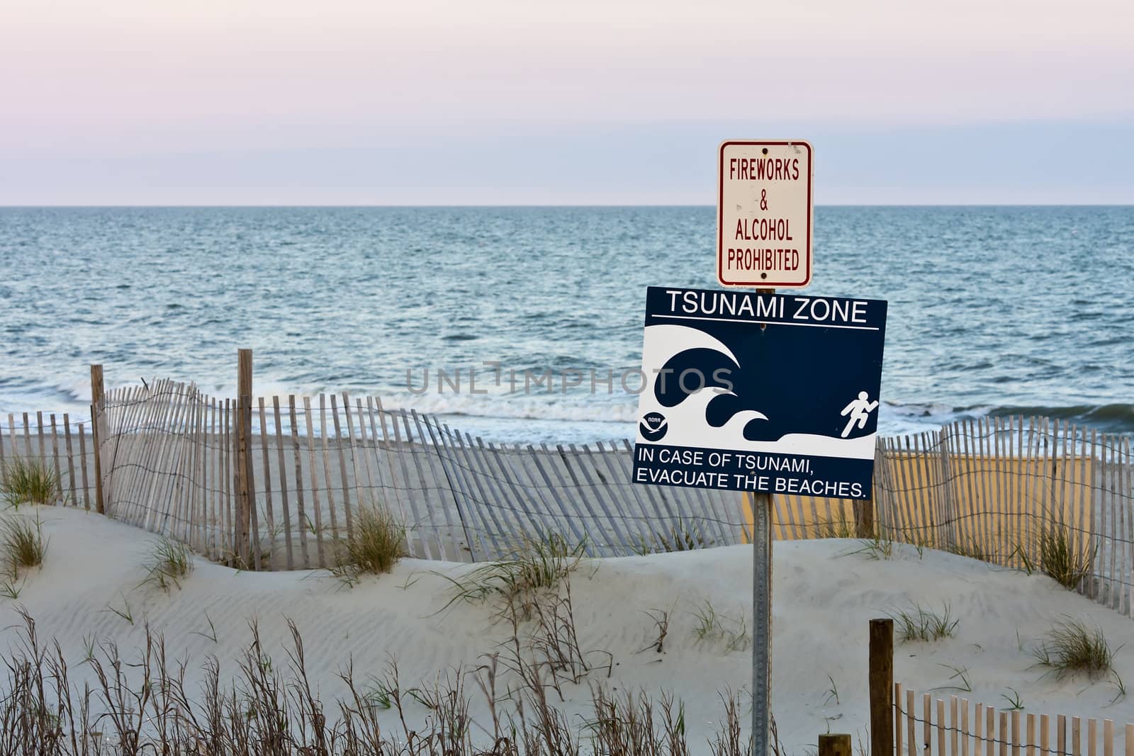 tsunami zone warning sign on the beach 