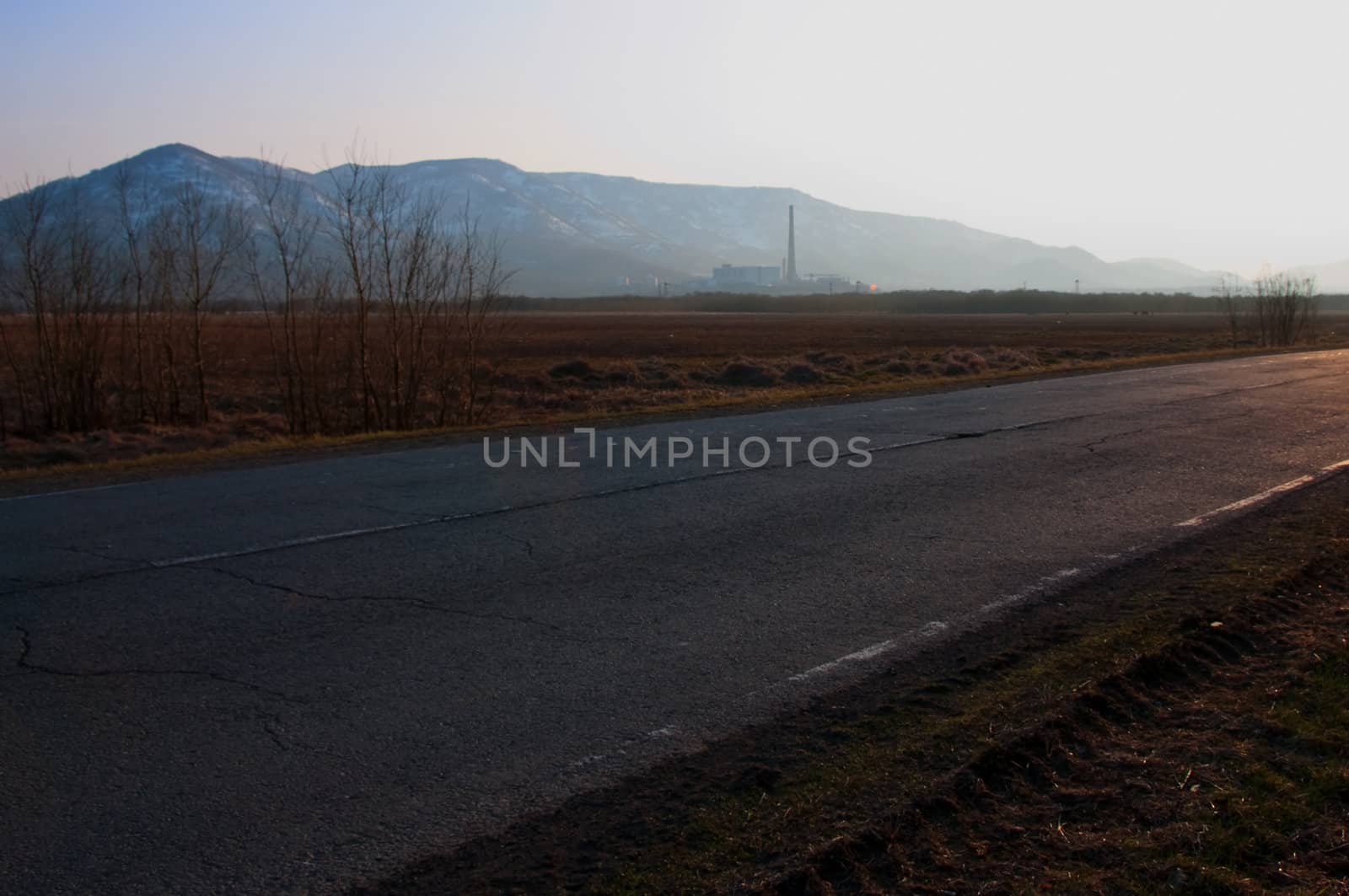 lonely evening country road landscape in Russia