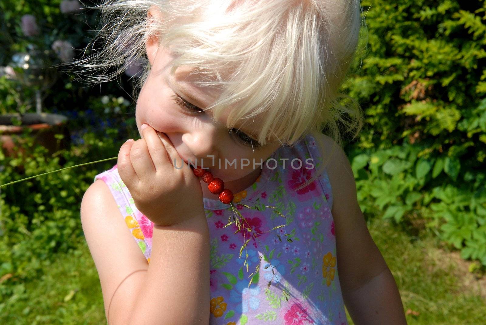 a happy girl with a bunch of fruit. Please note: No negative use allowed.