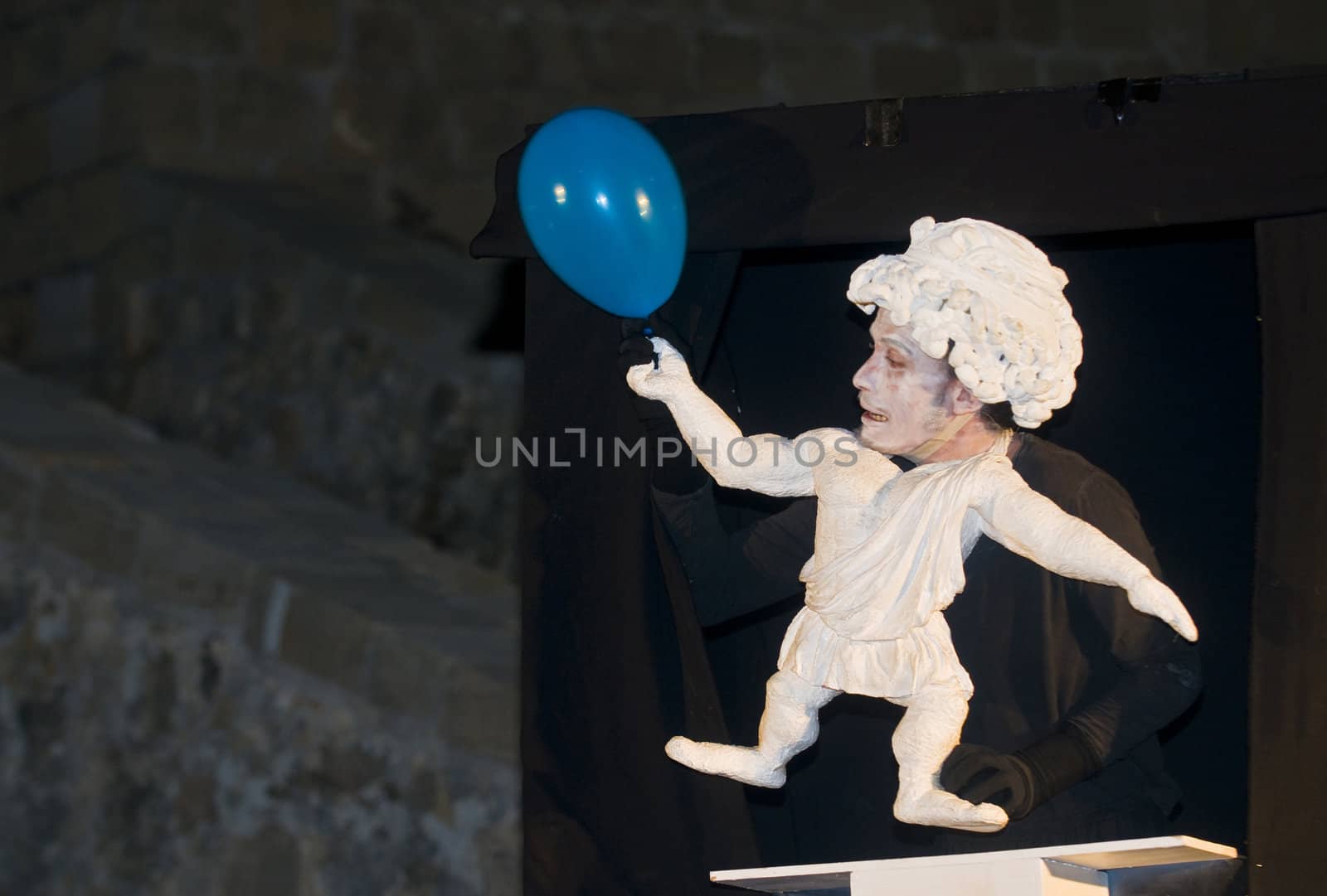 ACCO , ISRAEL - OCT 17 : An unidentified actor perform in the annual "Acco festival of alternative theatre"  take place in the old city of Acco , Israel on October 17 2011 