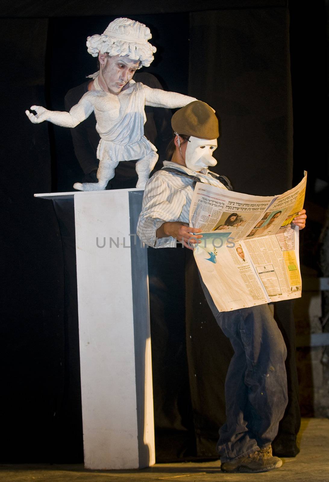 ACCO , ISRAEL - OCT 17 : An unidentified actors perform in the annual "Acco festival of alternative theatre"  take place in the old city of Acco , Israel on October 17 2011 