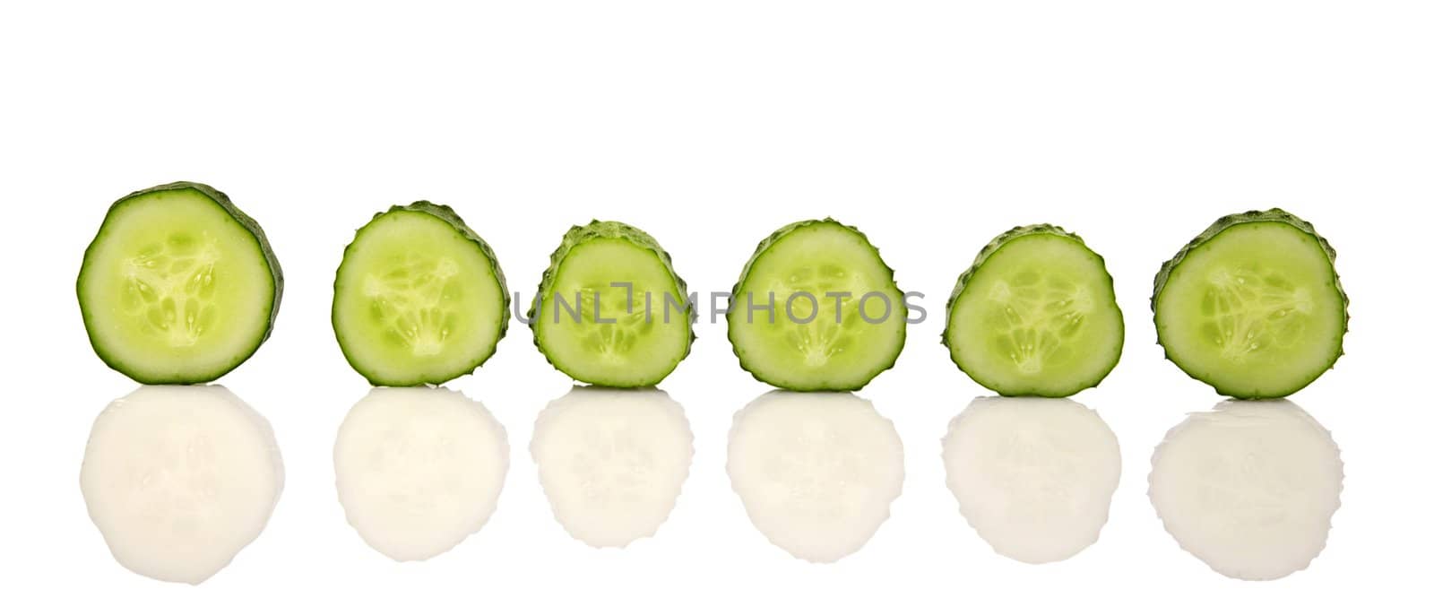 Green Cucumber sliced on a white background 