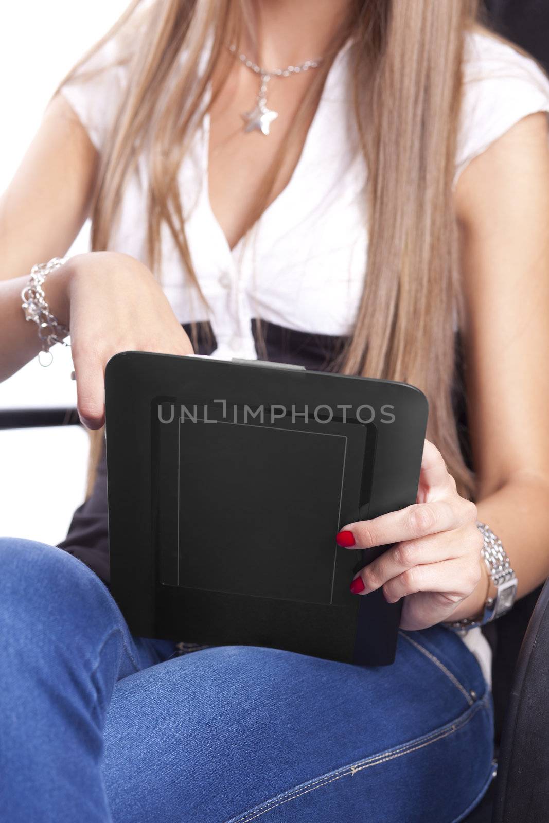 Woman Using Tablet Computer with fingers, closeup