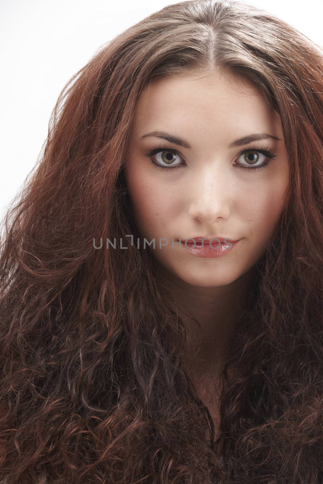 Portrait of beautiful young woman with make-up on white background