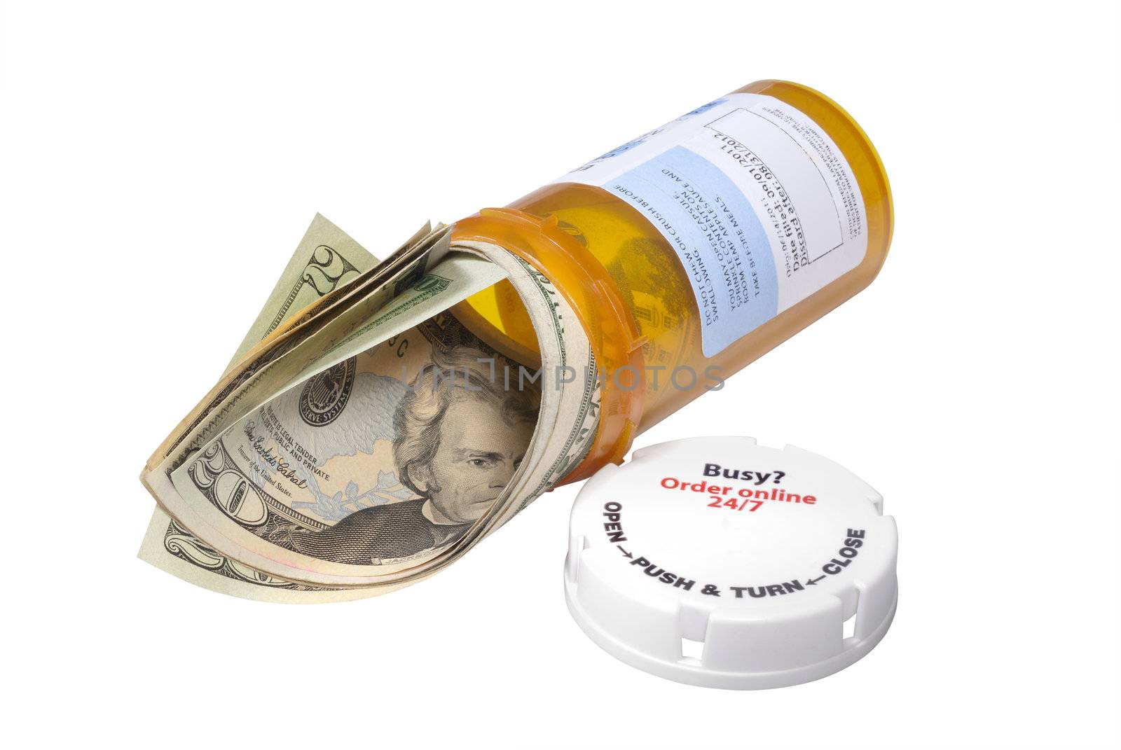 Prescription pill bottle with $20 bills inside. Concept or metaphor for cost of drugs. Isolated with clipping path