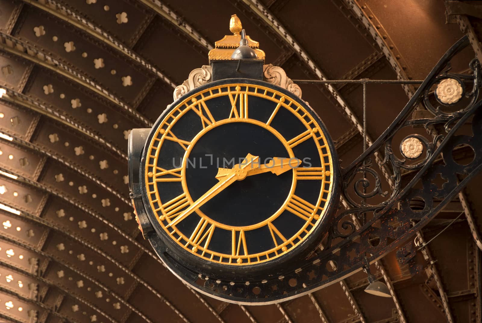 An Antique Black and Gold Railway Station Clock