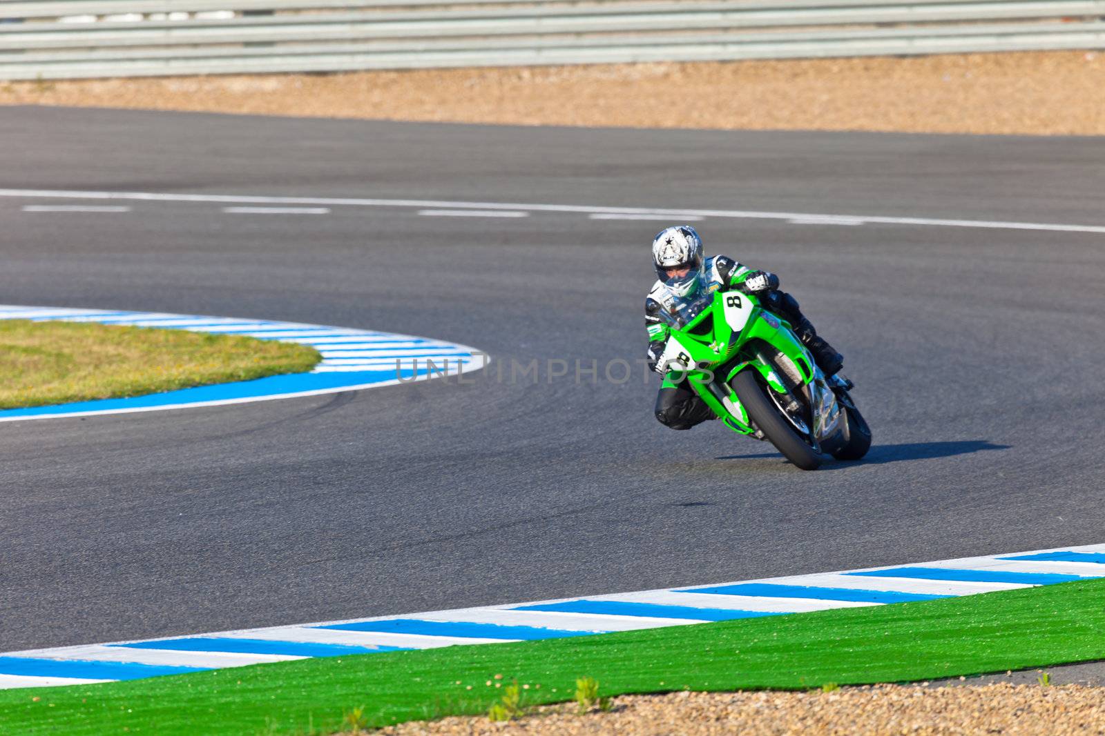 JEREZ DE LA FRONTERA, SPAIN - APR 16: Kawasaki Ninja Cup motorcyclist Adria Araujo takes a curve in the CEV Championship race on April 16, 2011 in Jerez de la Frontera, Spain.