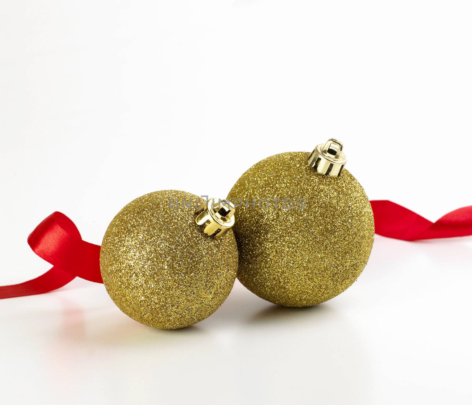 christmas balls with red ribbon by studiovitra