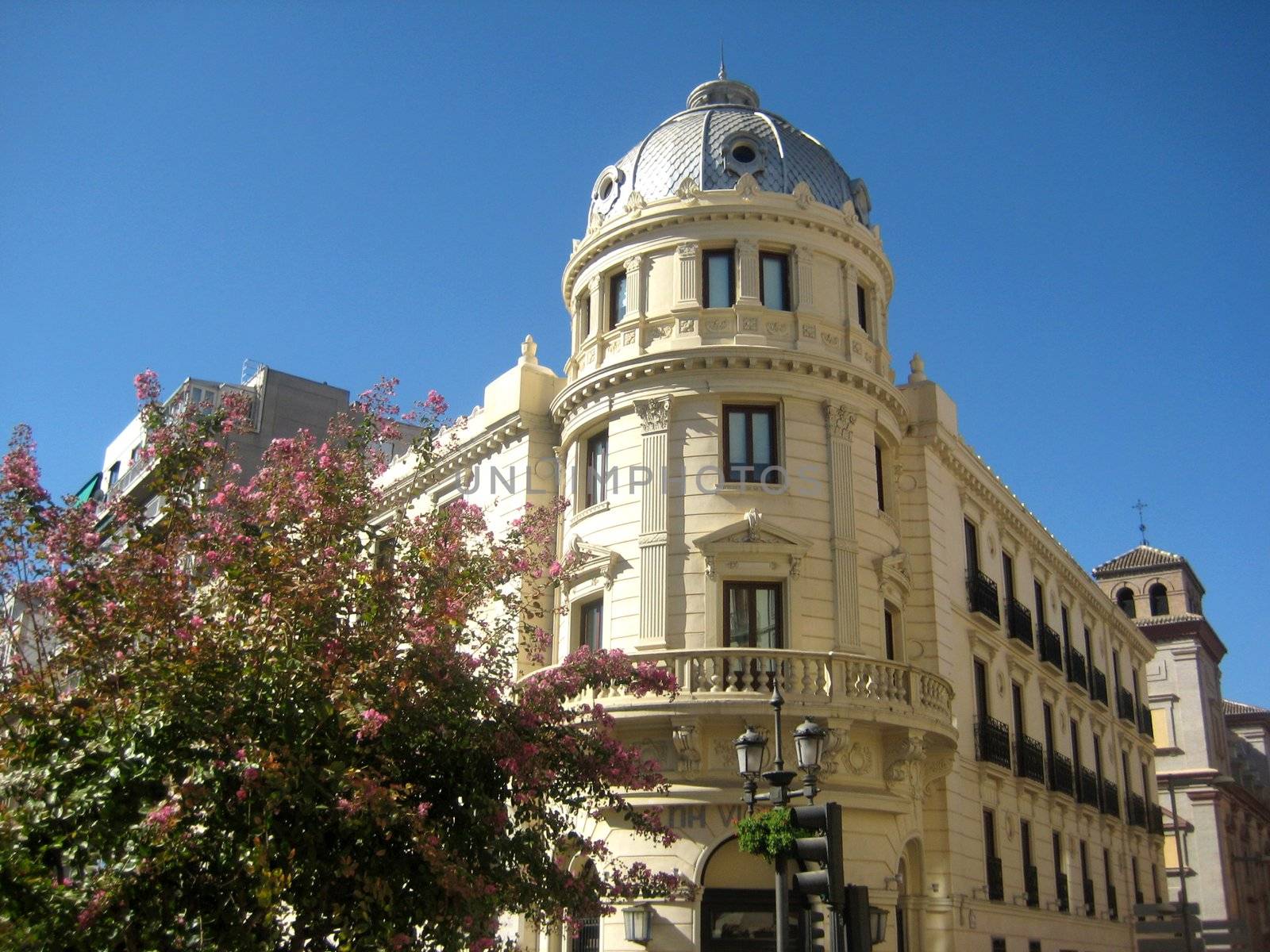 White building in Granada, Andalusia, Spain, summer