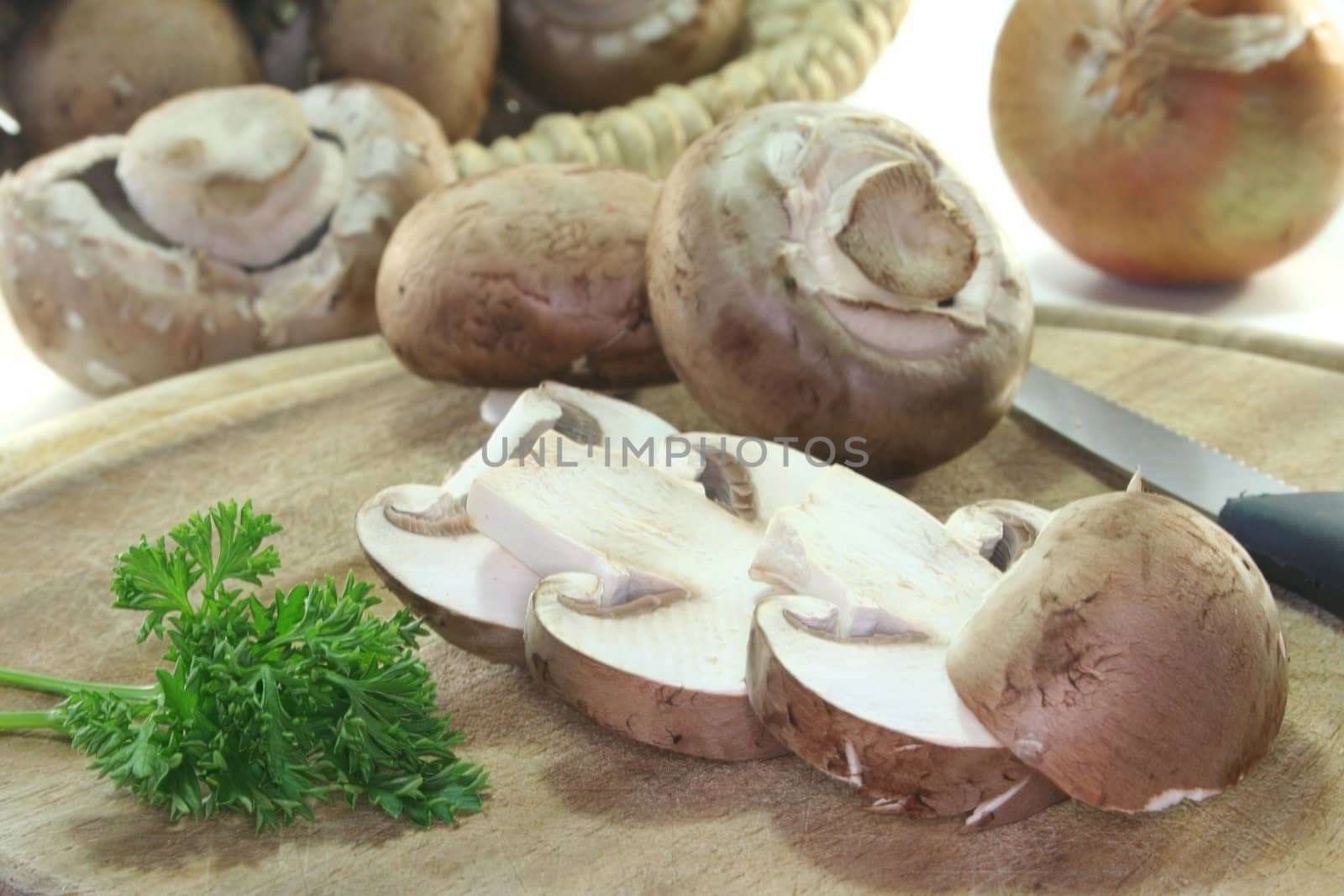 fresh mushrooms with parsley on white background