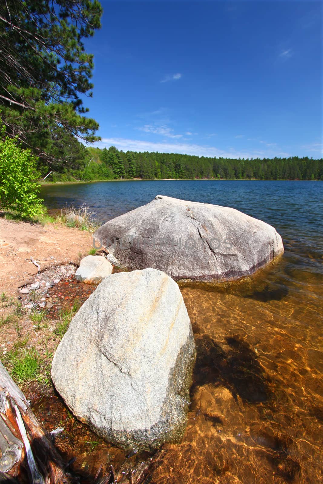 Huge boulder along the shoreline of Buffalo Lake in the Northern Highland-American Legion State Forest of Wisconsin.
