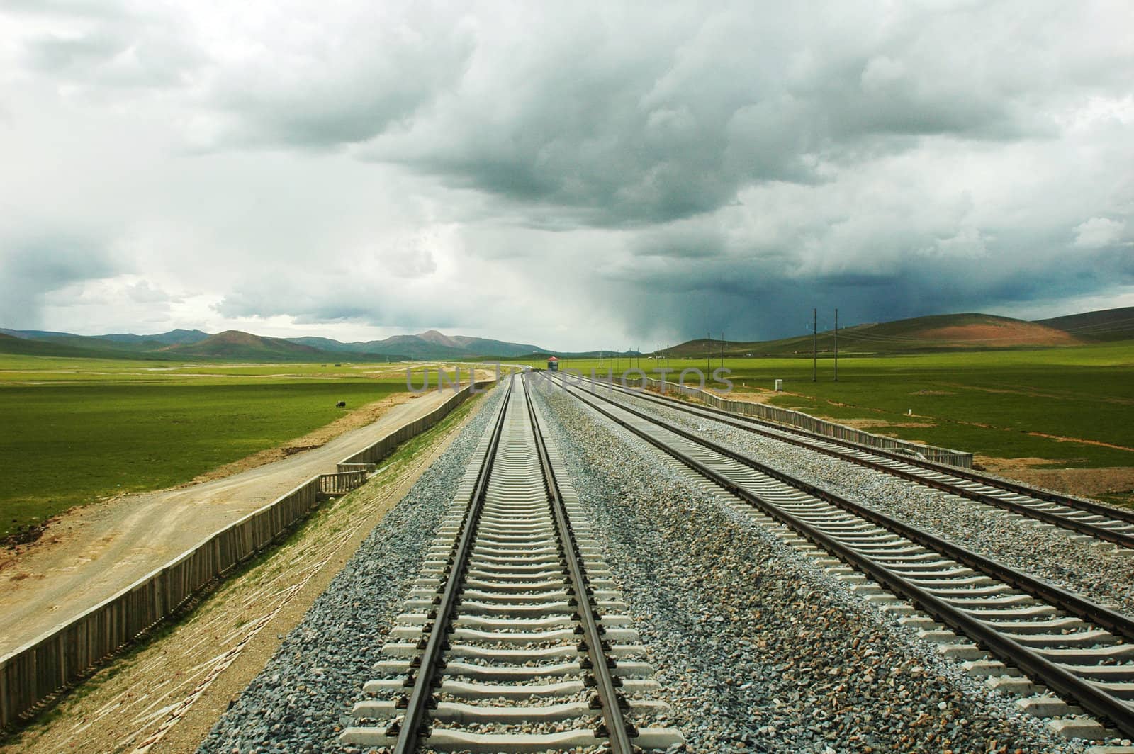 Landscape of railroads in a stormy day