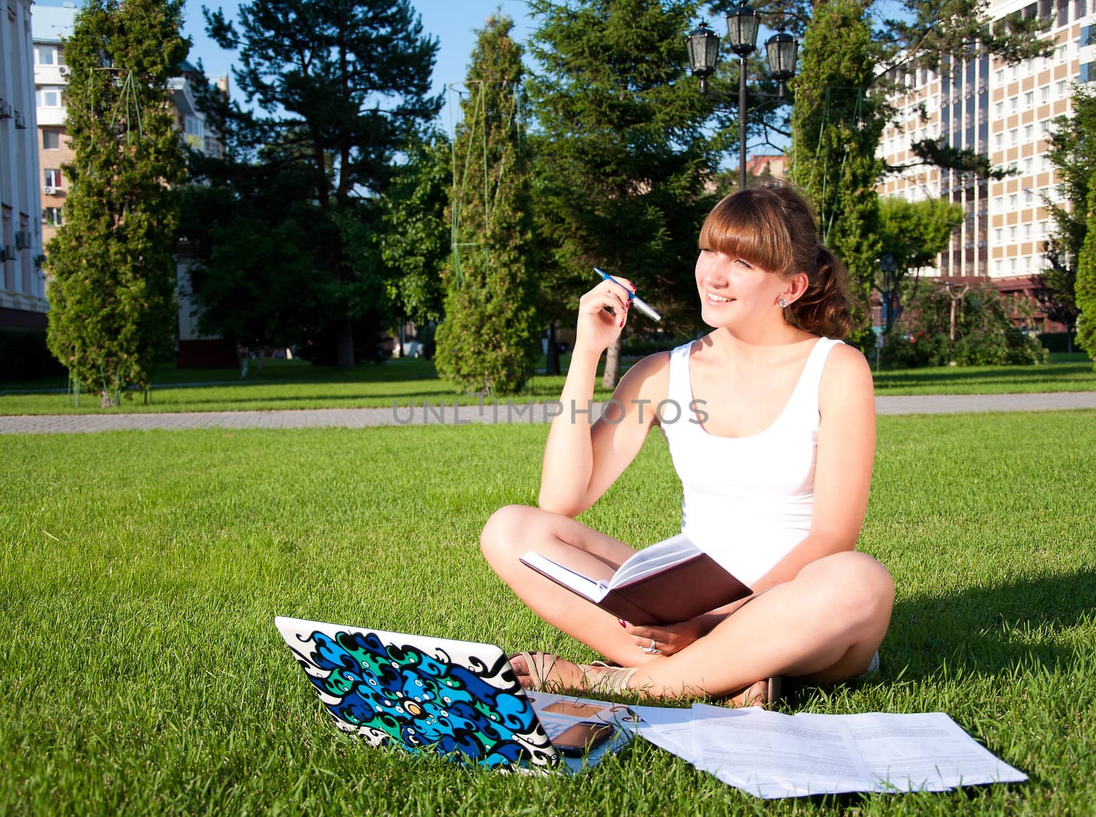 a young girl dressed in white, goes to the park, think about the task