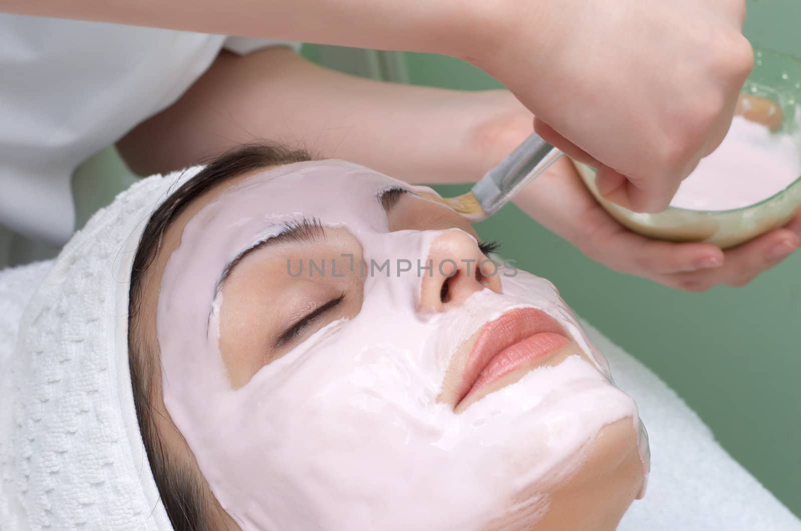 beauty salon series. facial mask applying