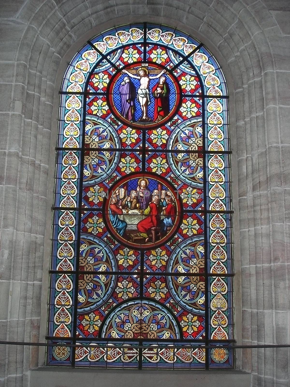Stained Glass Window Depicting Biblical Scenes Taken At Munster Cathedral In Basel Switzerland.