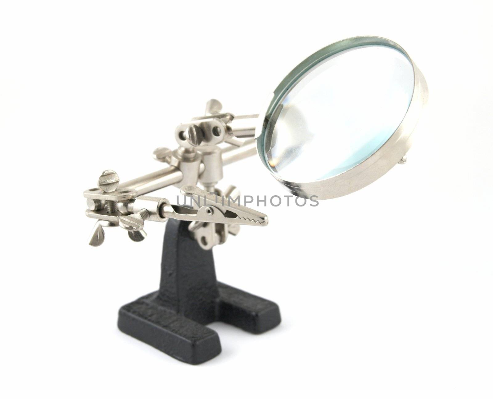 Clip with a magnifier for work with radio-electronic devices