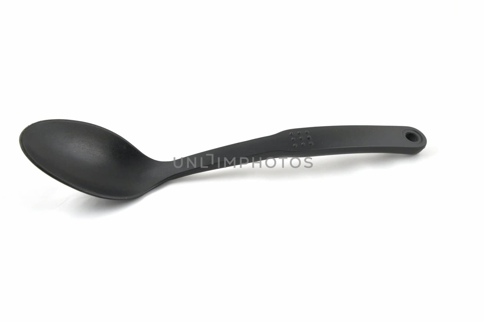 The greater spoon for soup on a white background