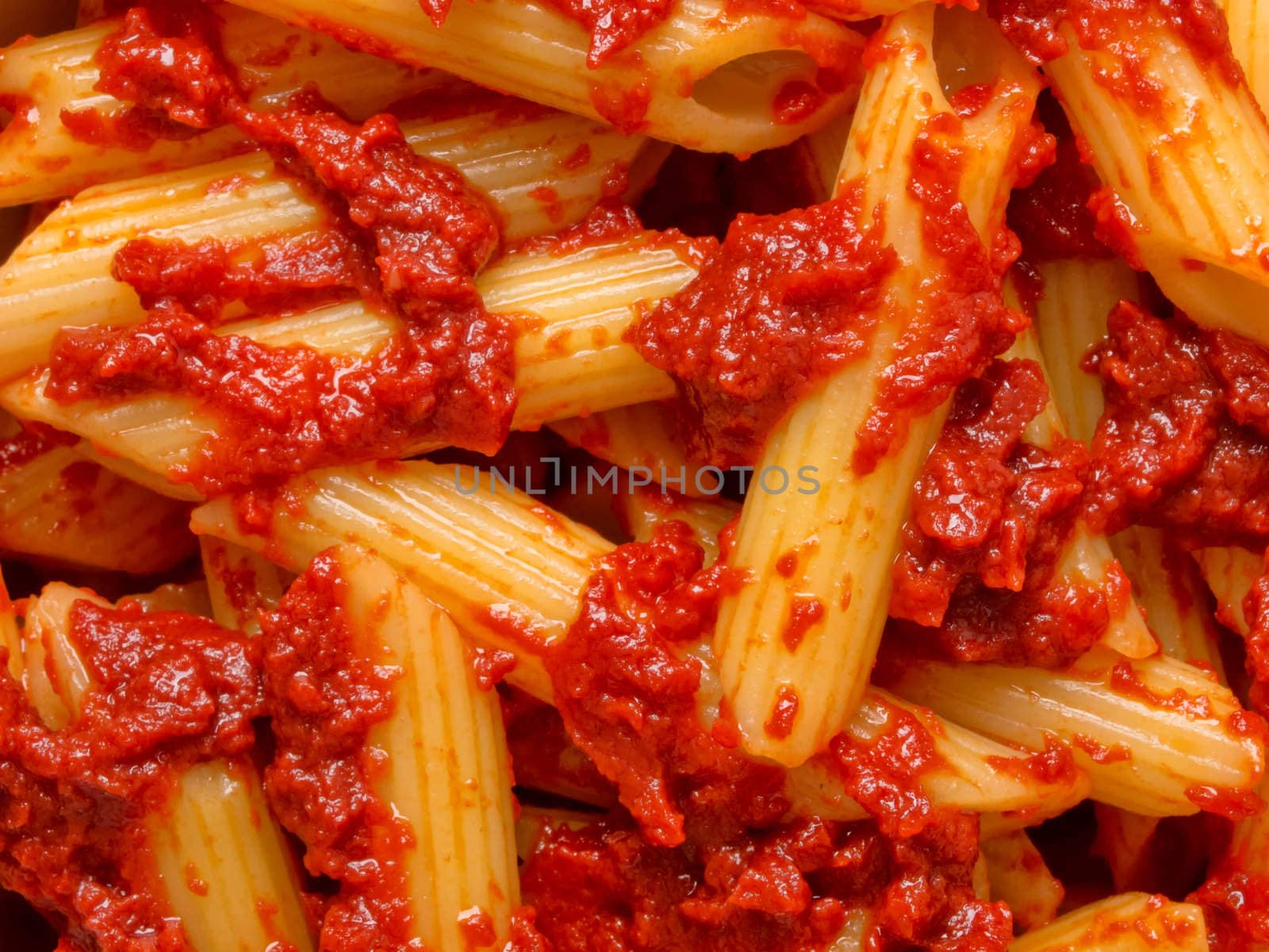 penne in tomato sauce food background