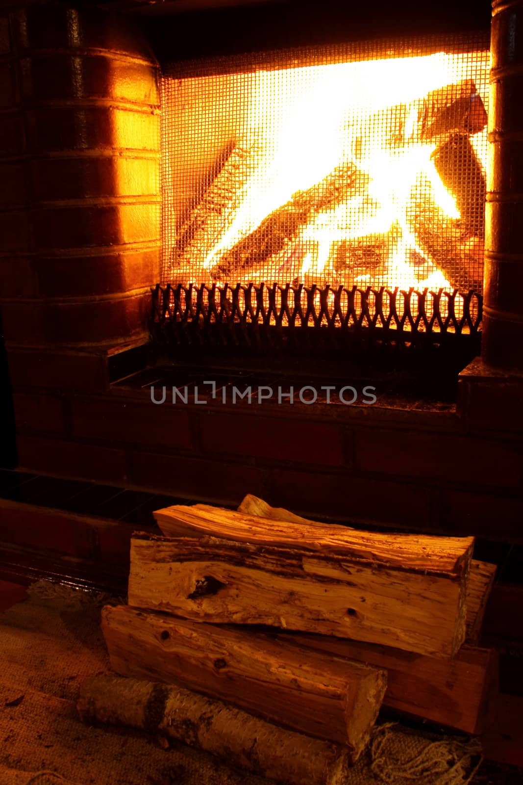 Homemade foto of warm fireplace at late evening