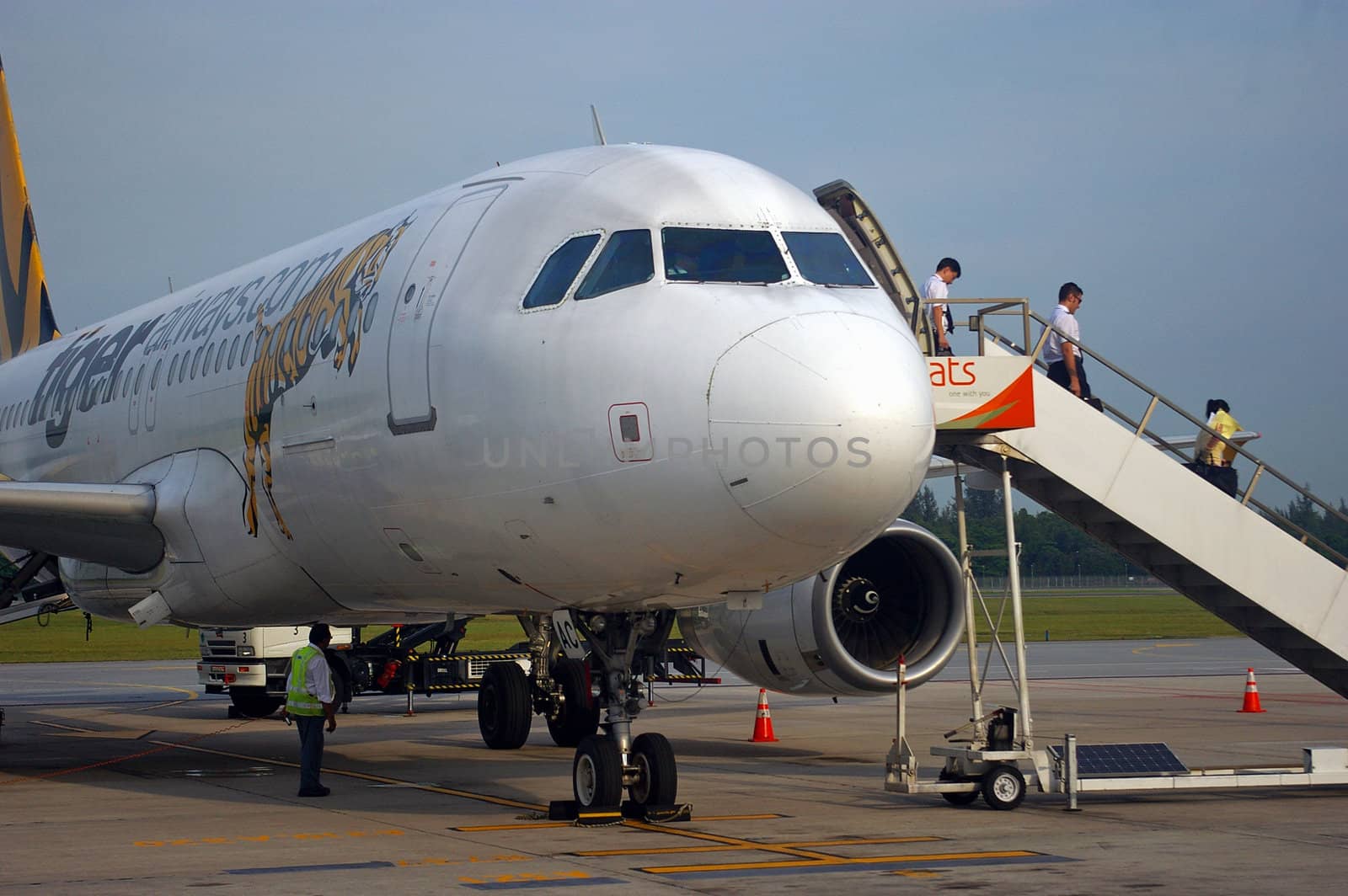 Pilots disembarking budget airlines, Tiger Airways, Singapore airport.