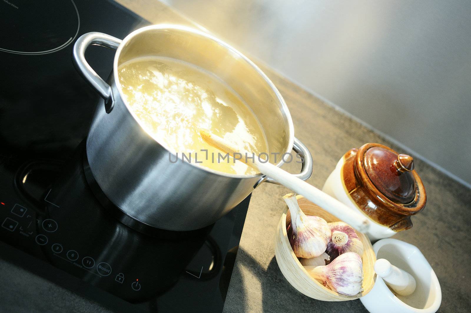 development of a recipe in a saucepan on the fire