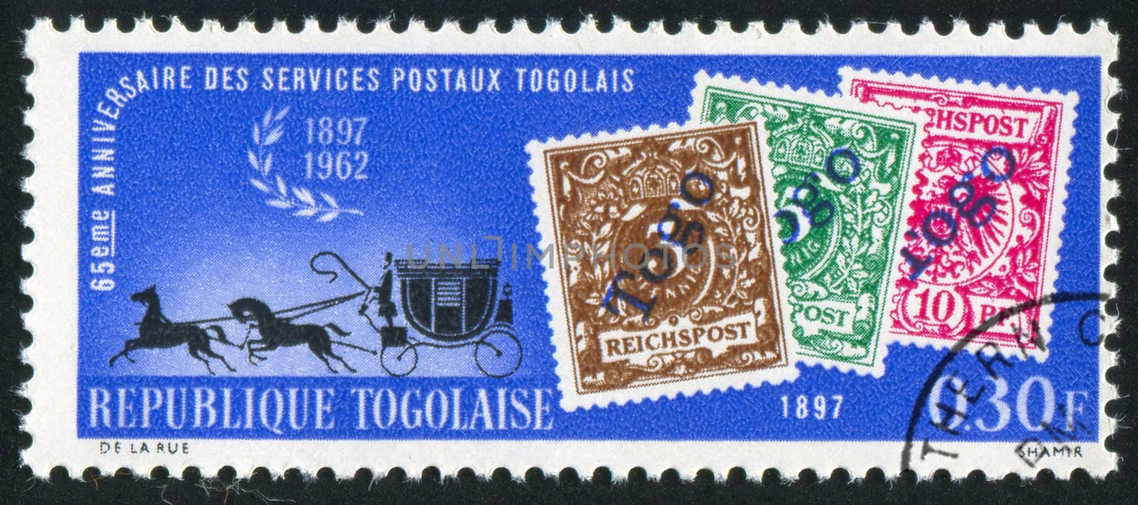 TOGO - CIRCA 1963: stamp printed by Togo, shows Mail Coach and Stamps of 1897, circa 1963