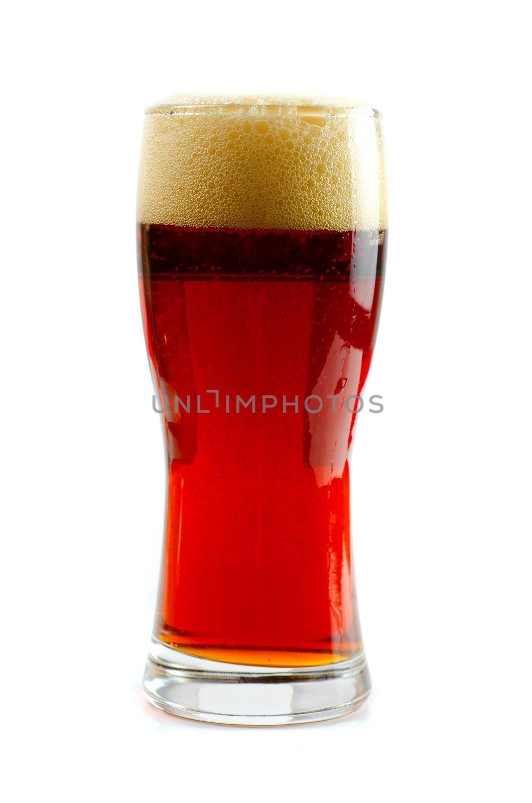 Glass of dark beer isolated on a white background