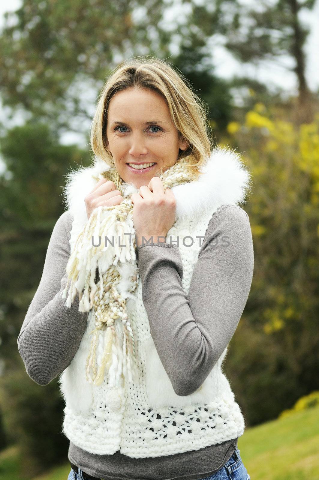 blond woman outdoor with winter closed