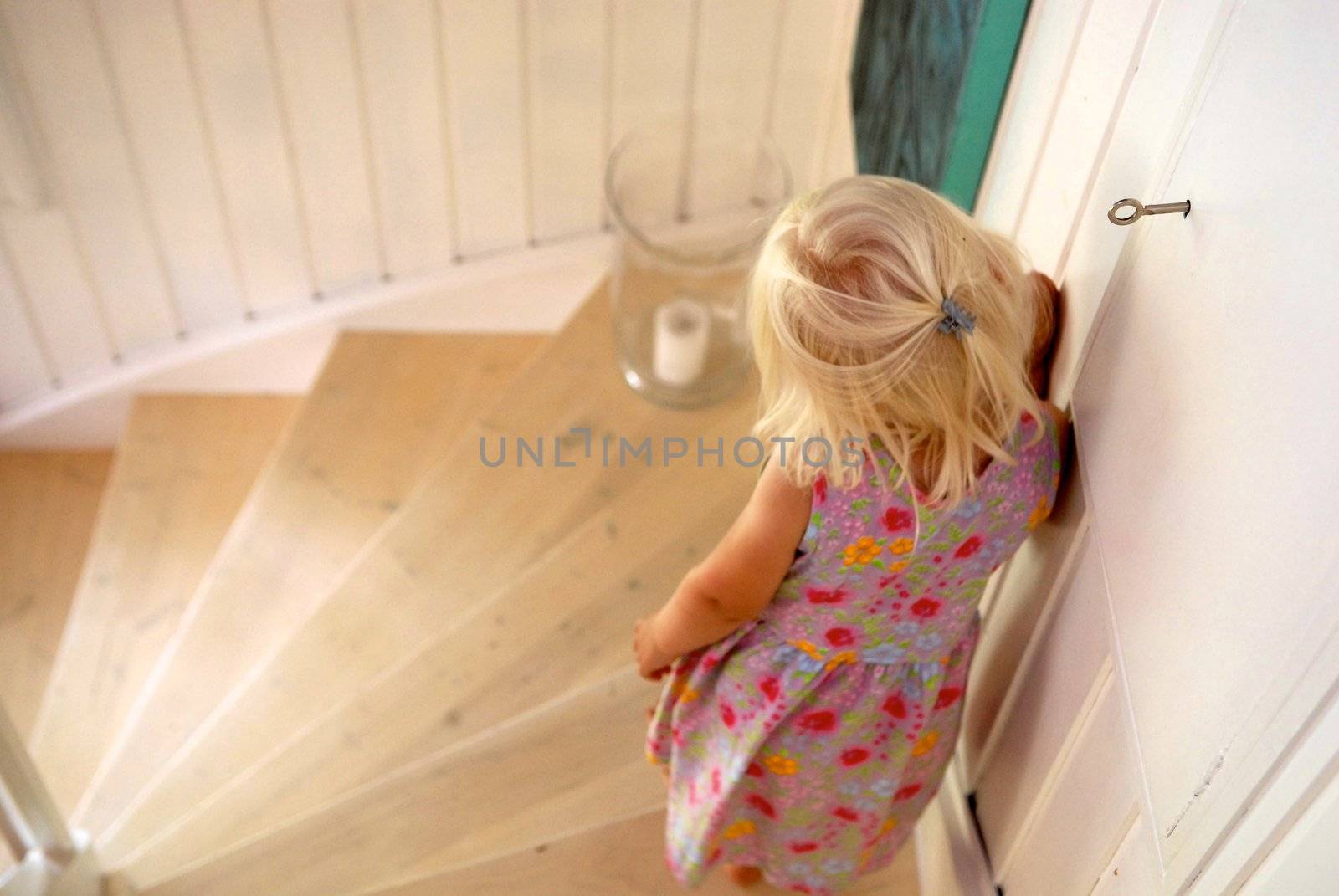girl going down stairs. Please note: No negative use allowed.