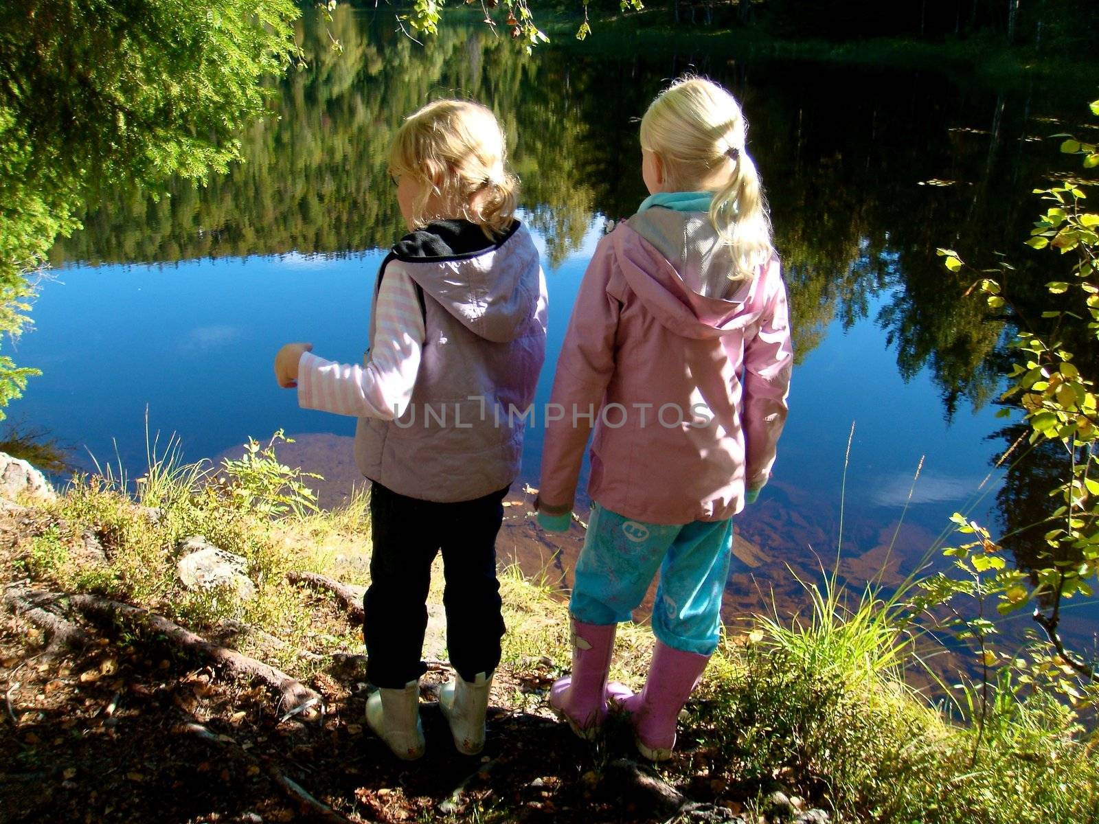 girls playing in the wild