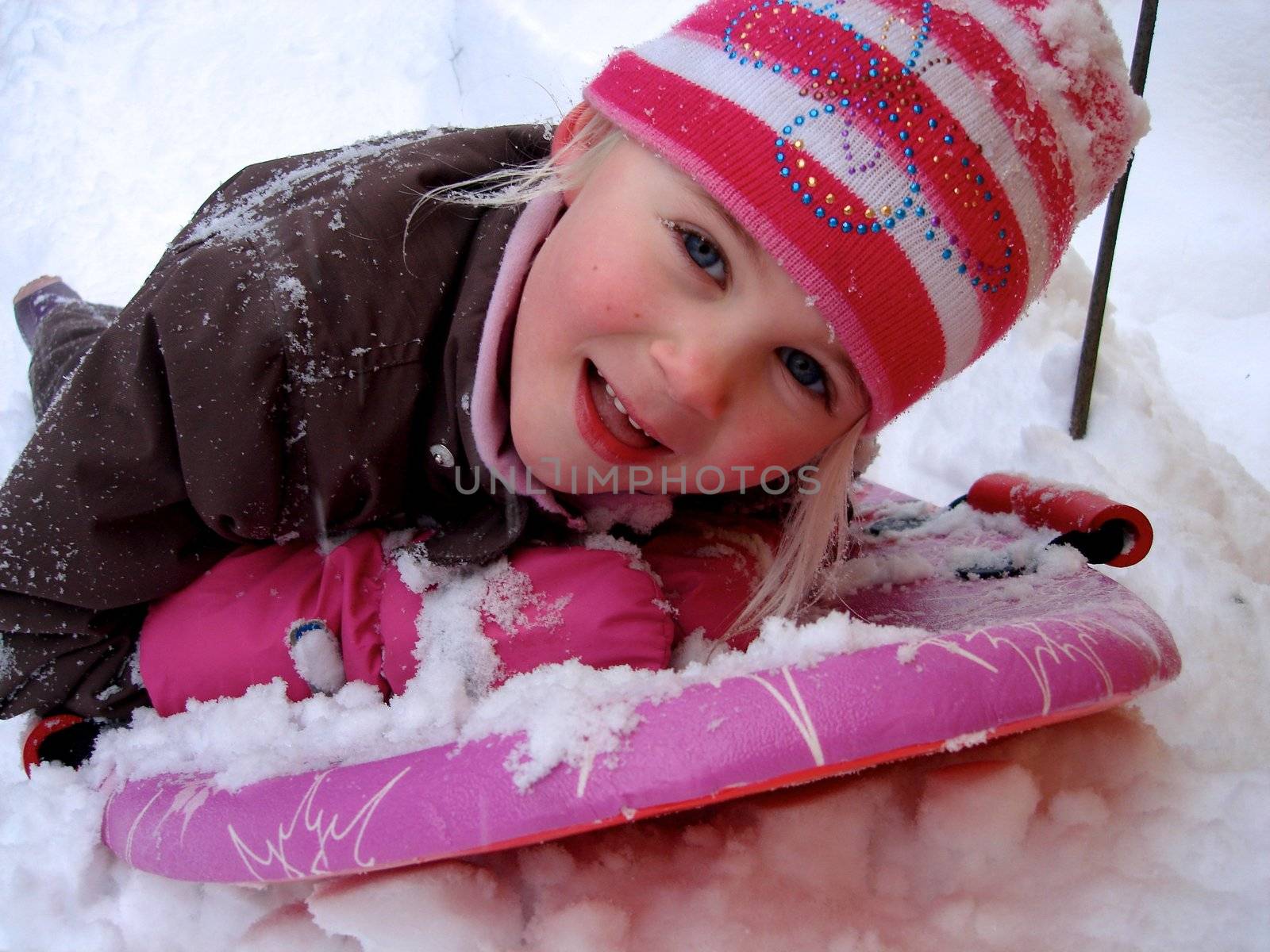 happy girl skiing. Please note: No negative use allowed.