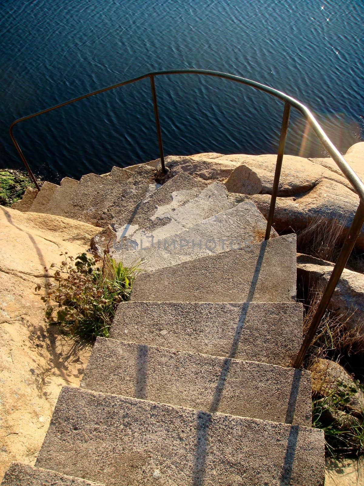 stairs at the seaside. Please note: No negative use allowed.