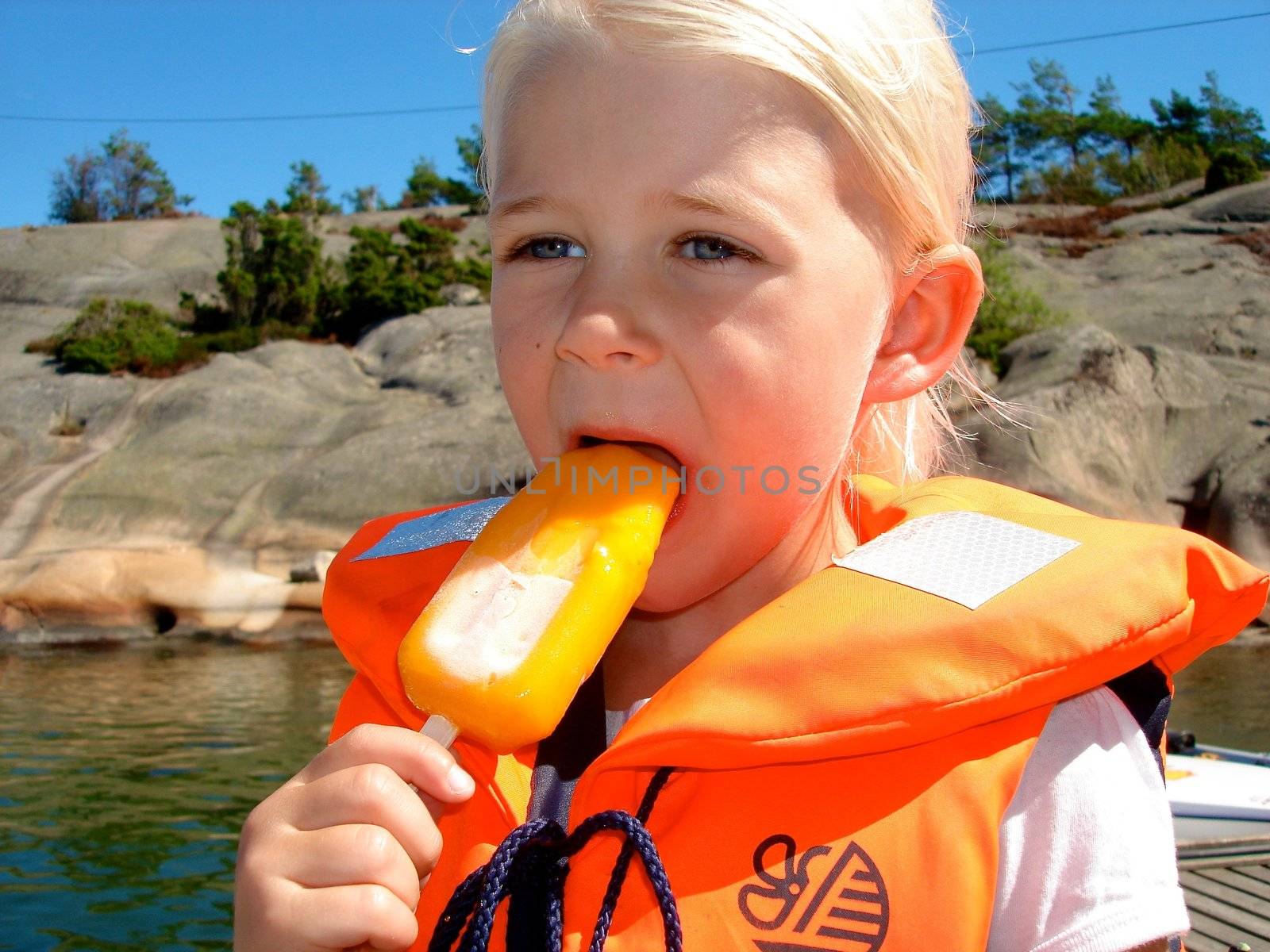 girl eating the ice cream. Please note: No negative use allowed.