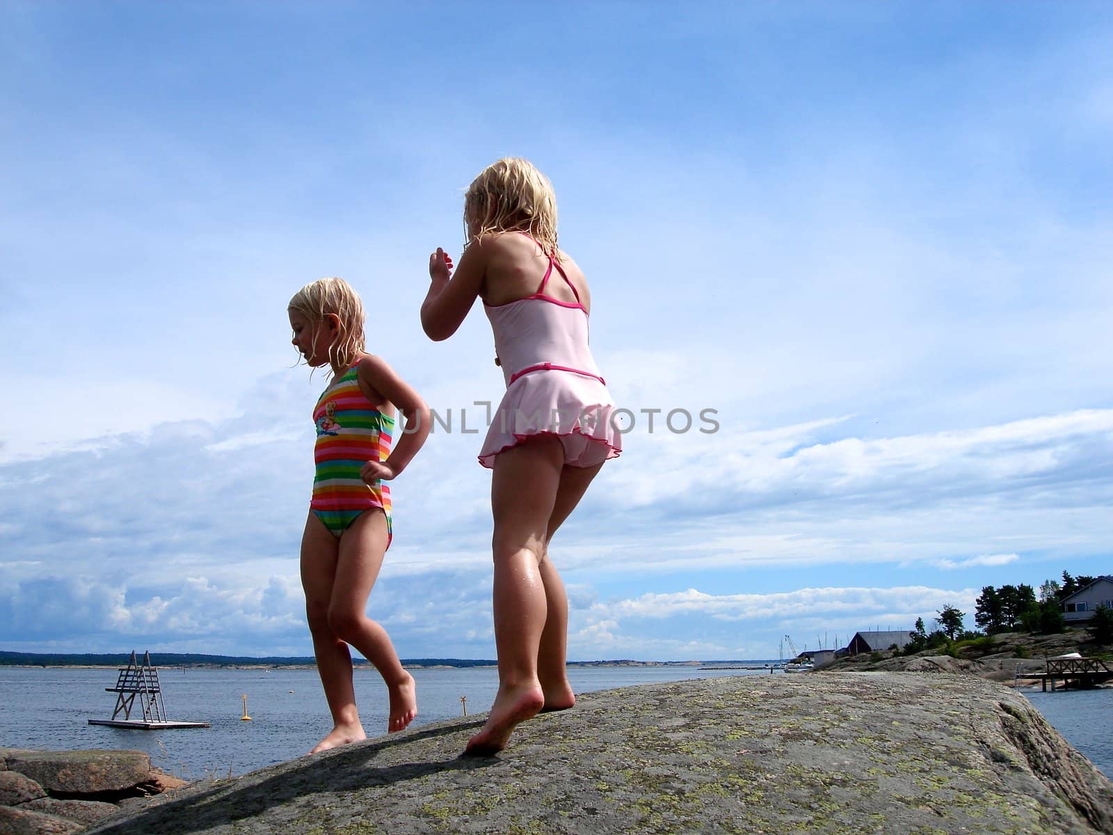 girls playing at the seaside