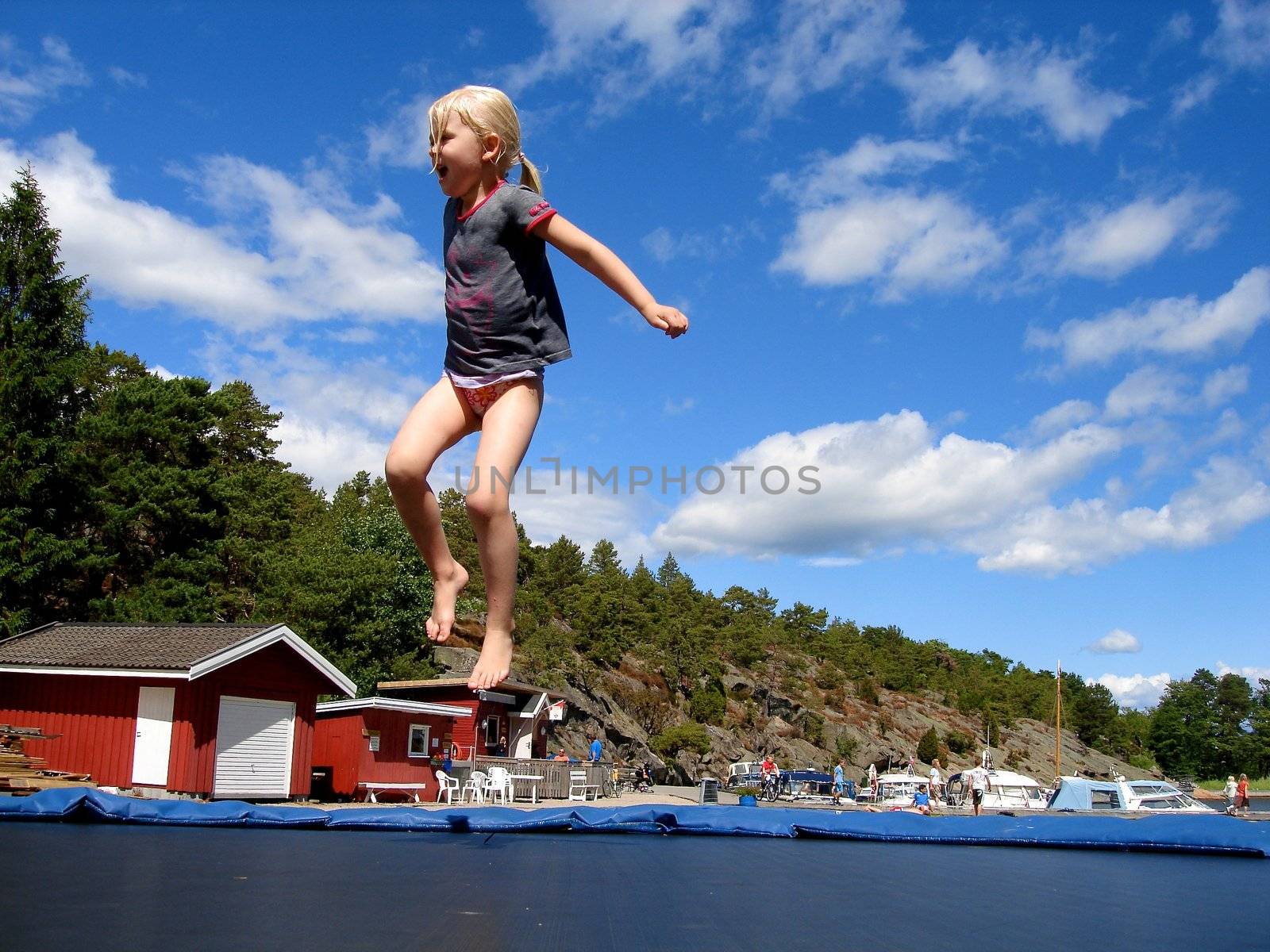 children playing on the trampoline. Please note: No negative use allowed.