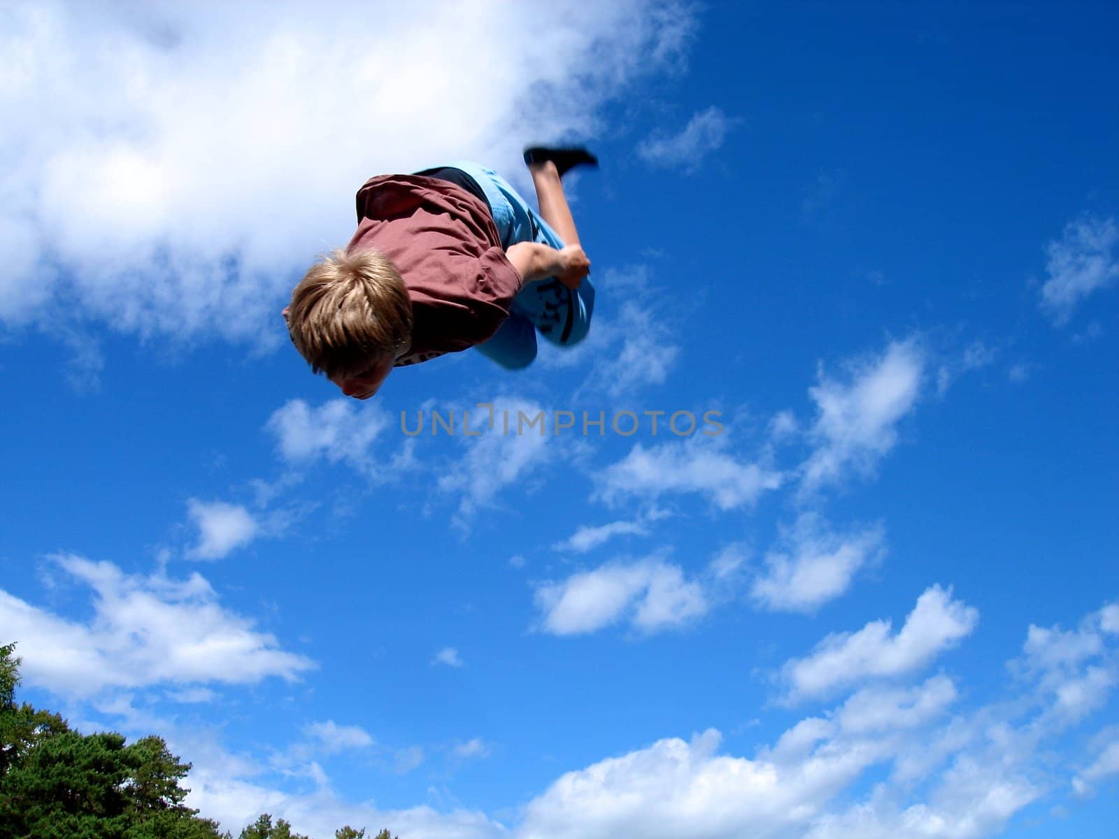 children playing on the trampoline. Please note: No negative use allowed.