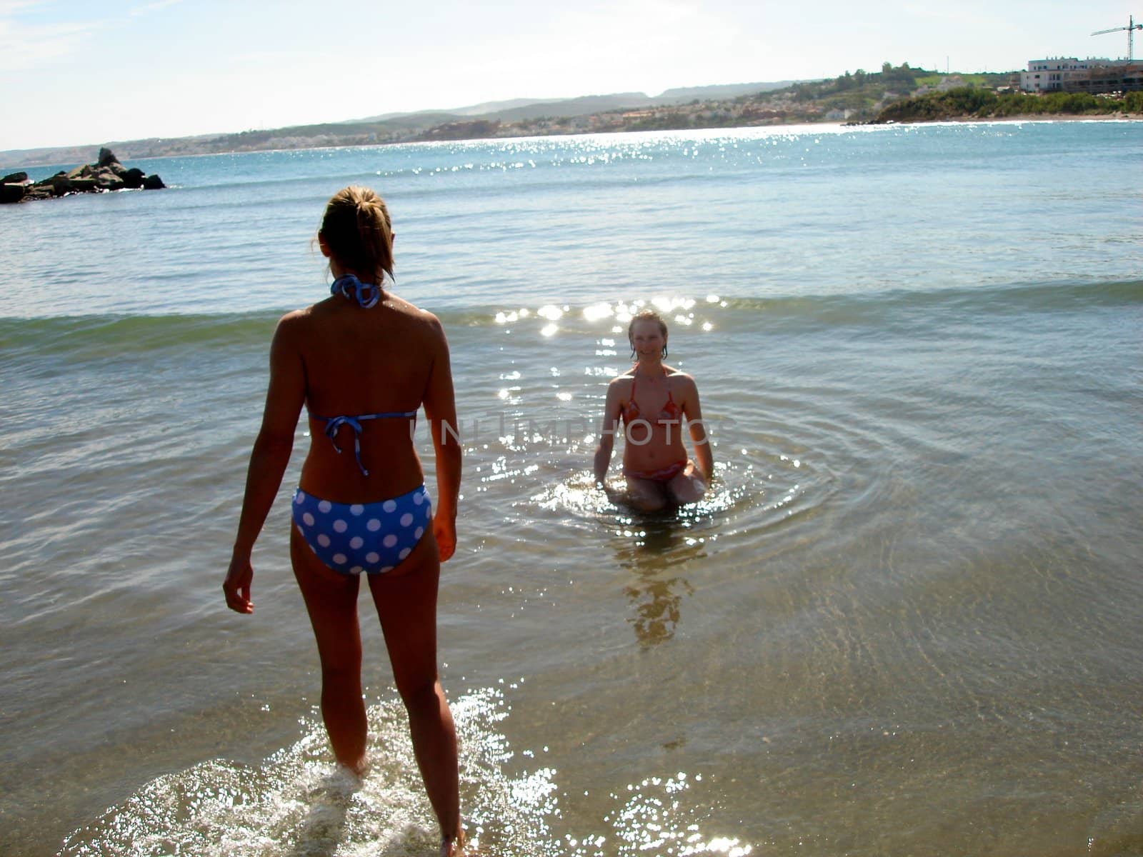 Scandinavian Lifestyle - beautiful ladies swimming in the sea by Bildehagen