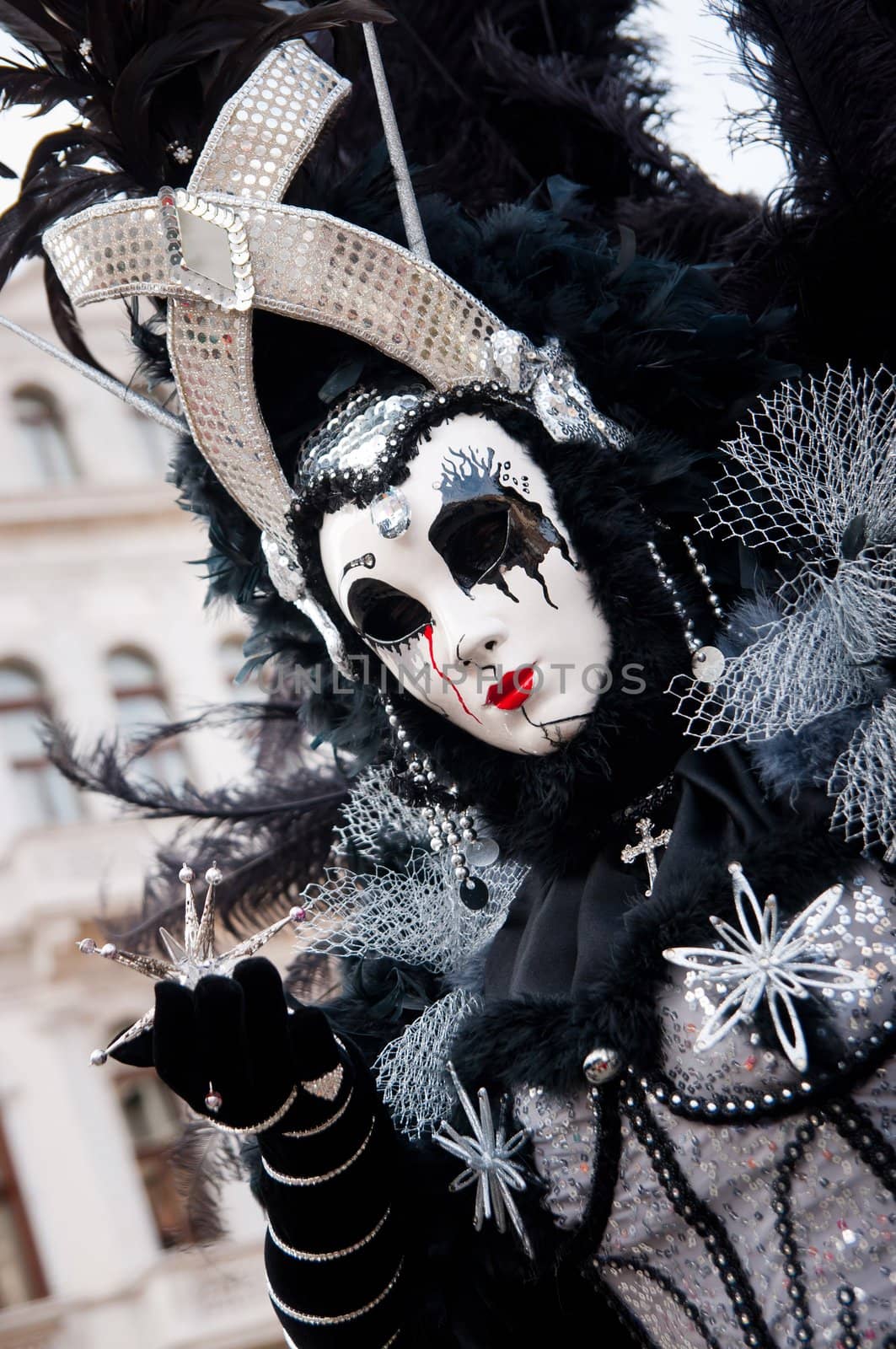 Traditional Venice Carnival mask in San Marco square Venice. Vertical view