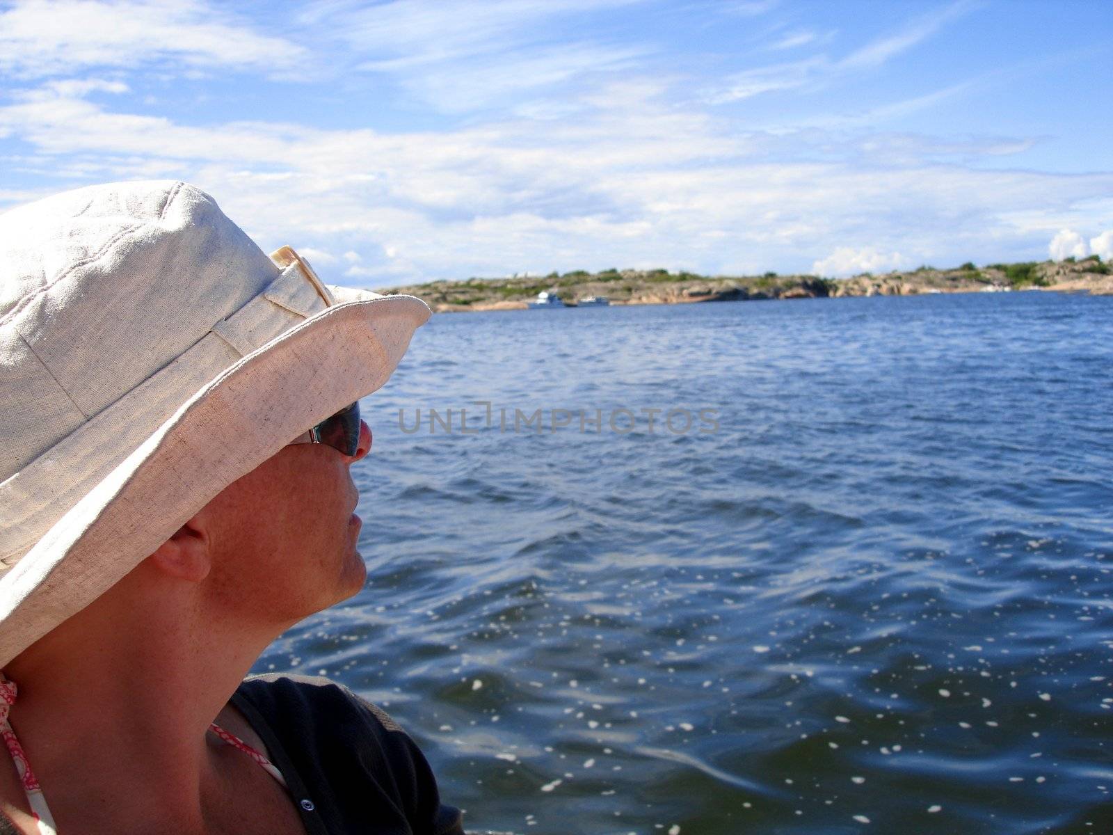 Scandinavian Lifestyle - beautiful lady look over the sea by Bildehagen
