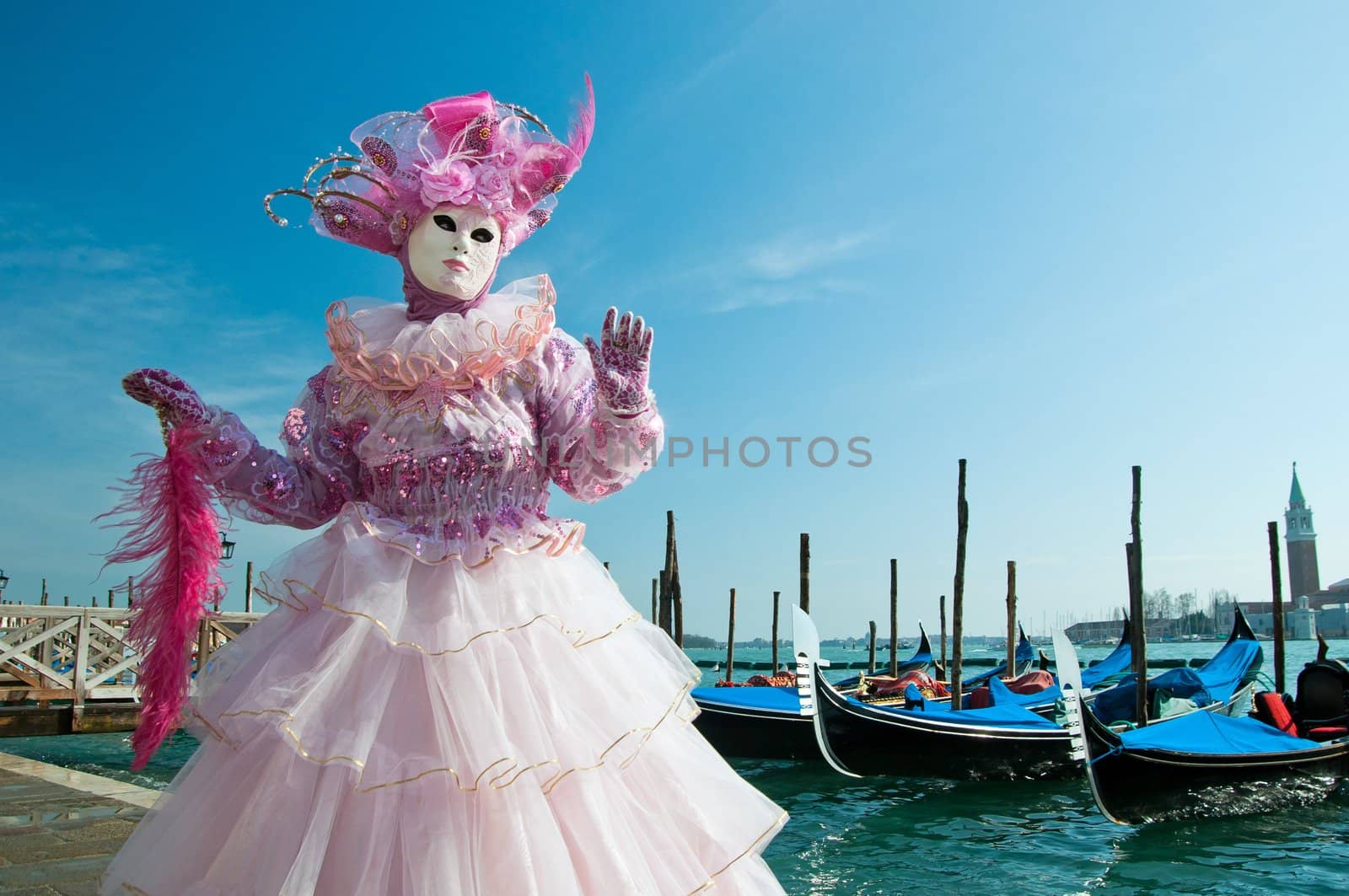 Traditional Venice Carnival mask in San Marco square Venice. Vertical view