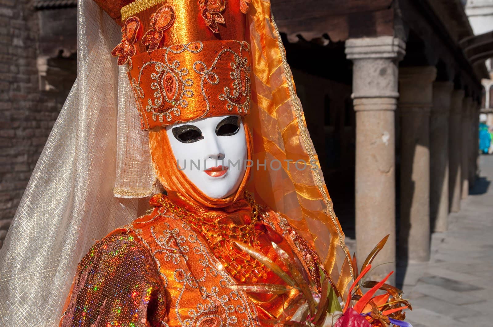 Traditional Venice Carnival mask in San Marco square Venice.