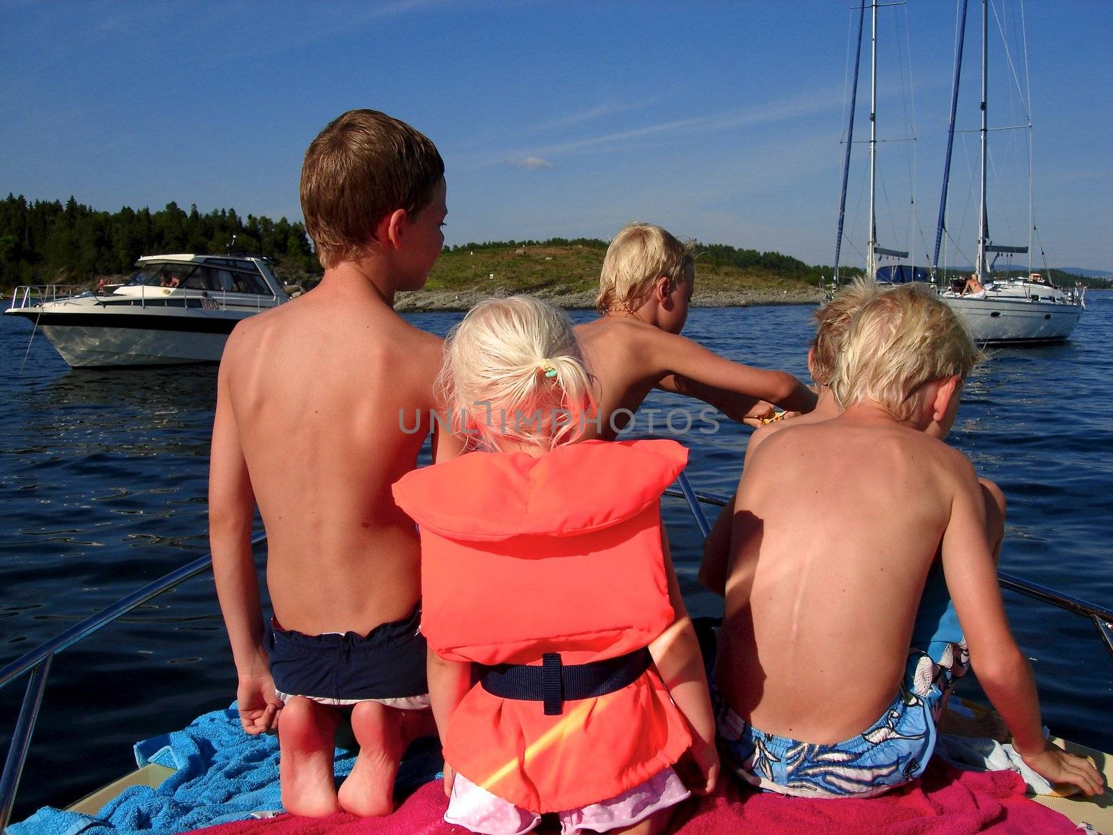 children playing on the boat. Please note: No negative use allowed.