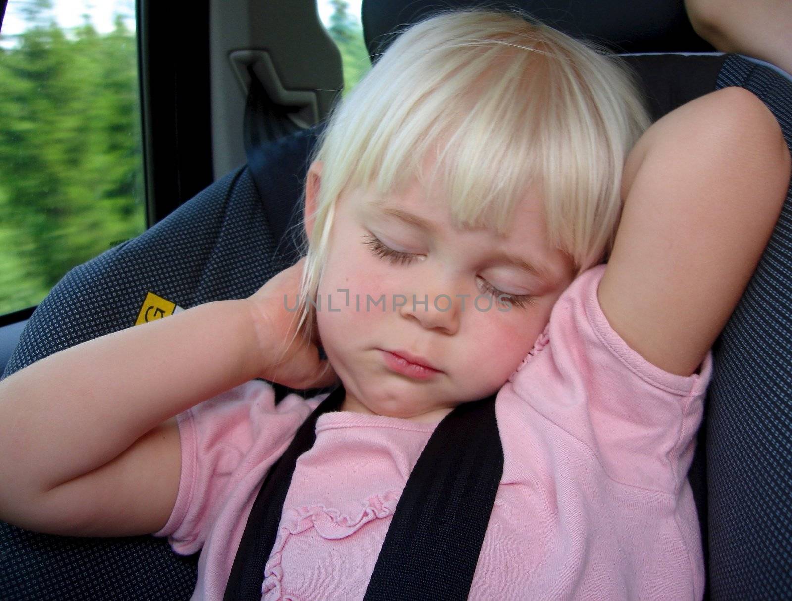 girl sleeping in the car