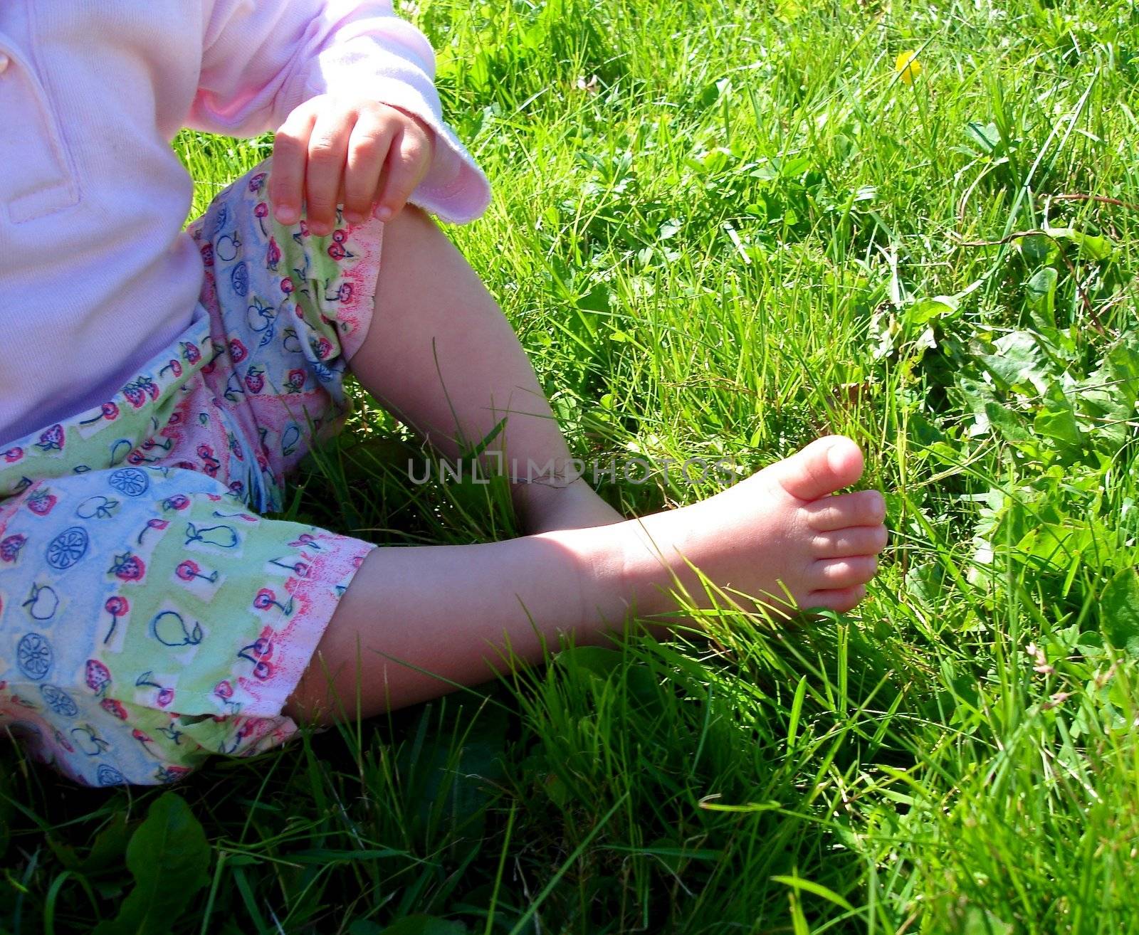 girl's bare foot. Please note: No negative use allowed.