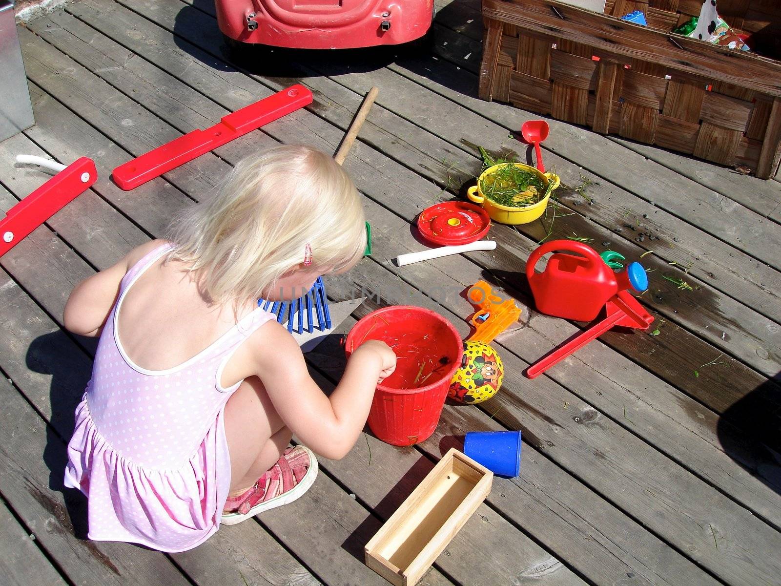 girl playing in the garden. Please note: No negative use allowed.