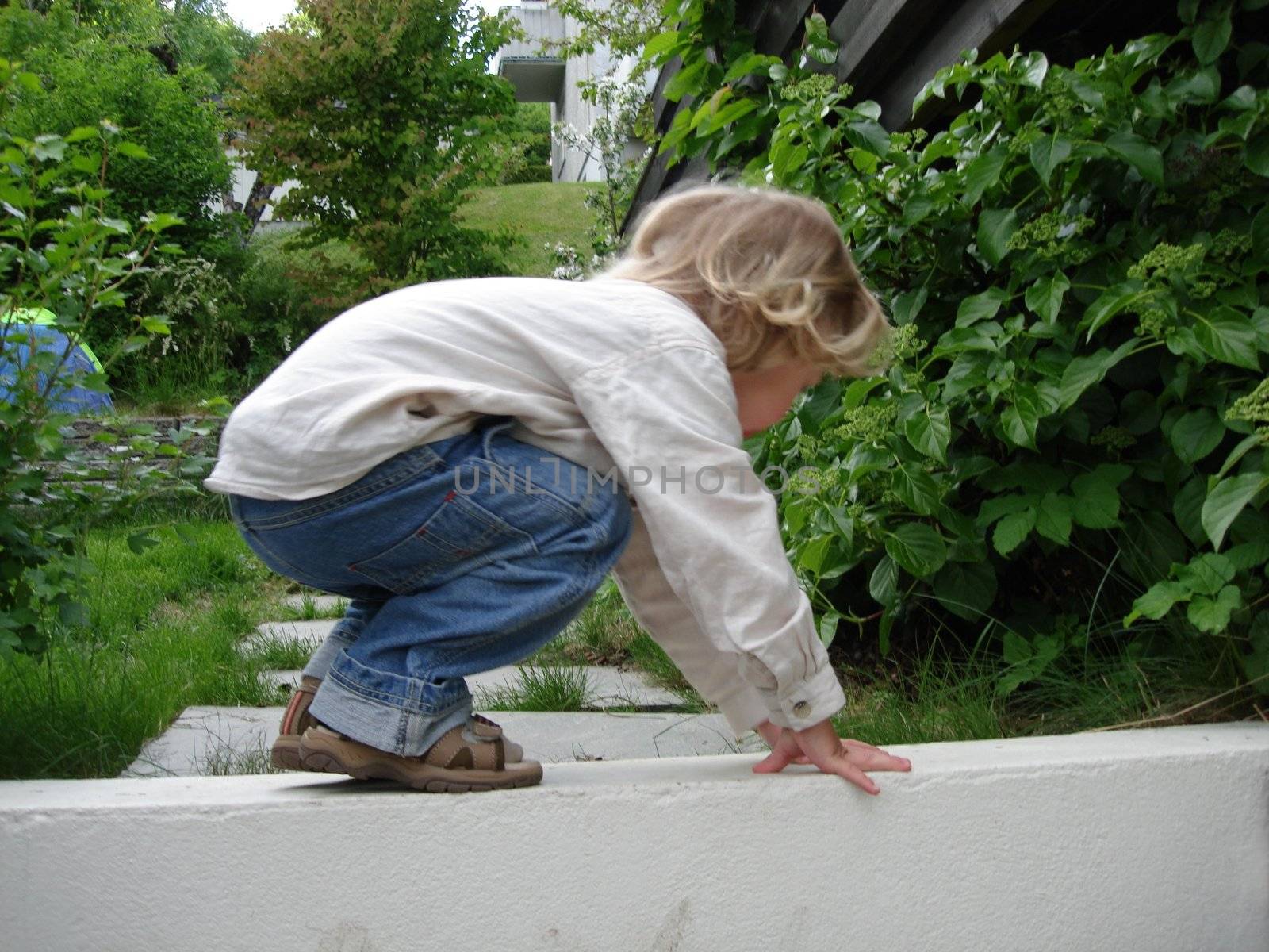 girl climbing on the wall. Please note: No negative use allowed.