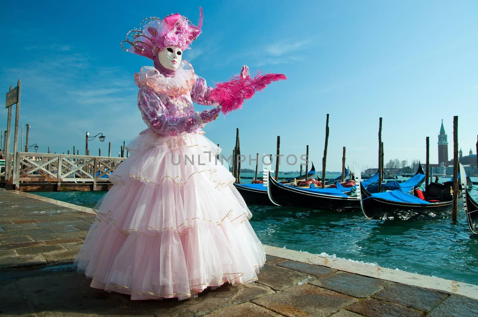 Traditional Venice Carnival mask in San Marco square Venice.