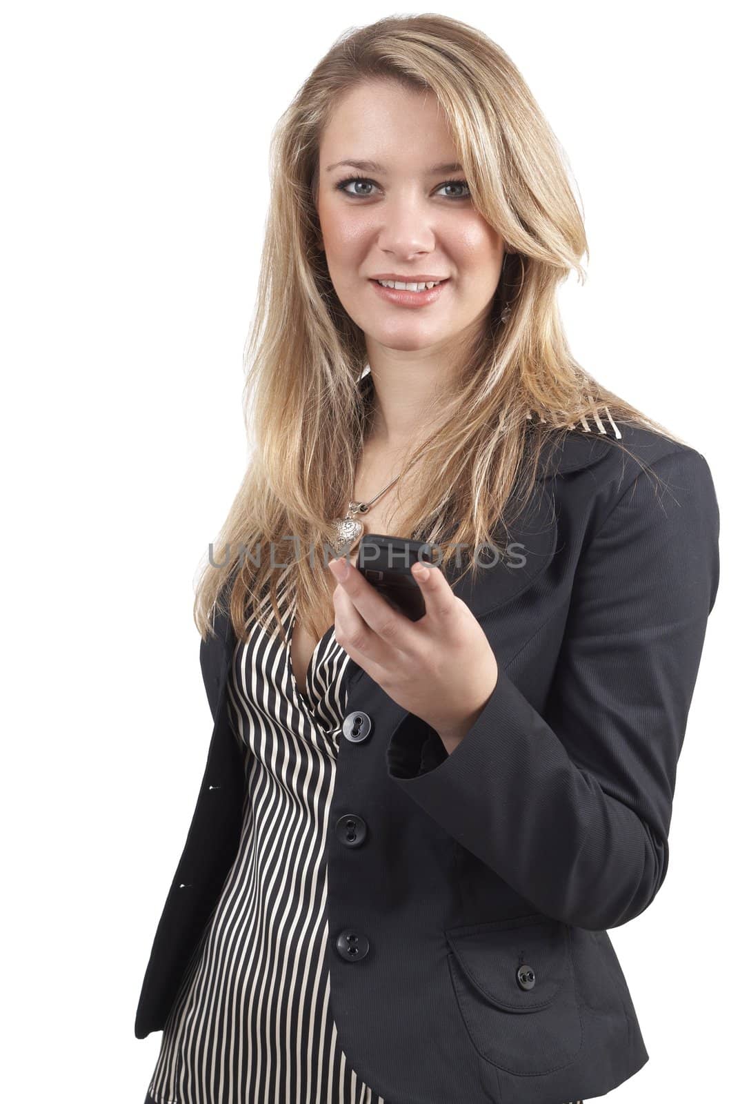 Beautiful blonde businesswoman wearing office clothes typing an sms on her mobile phone. Isolated on white background 